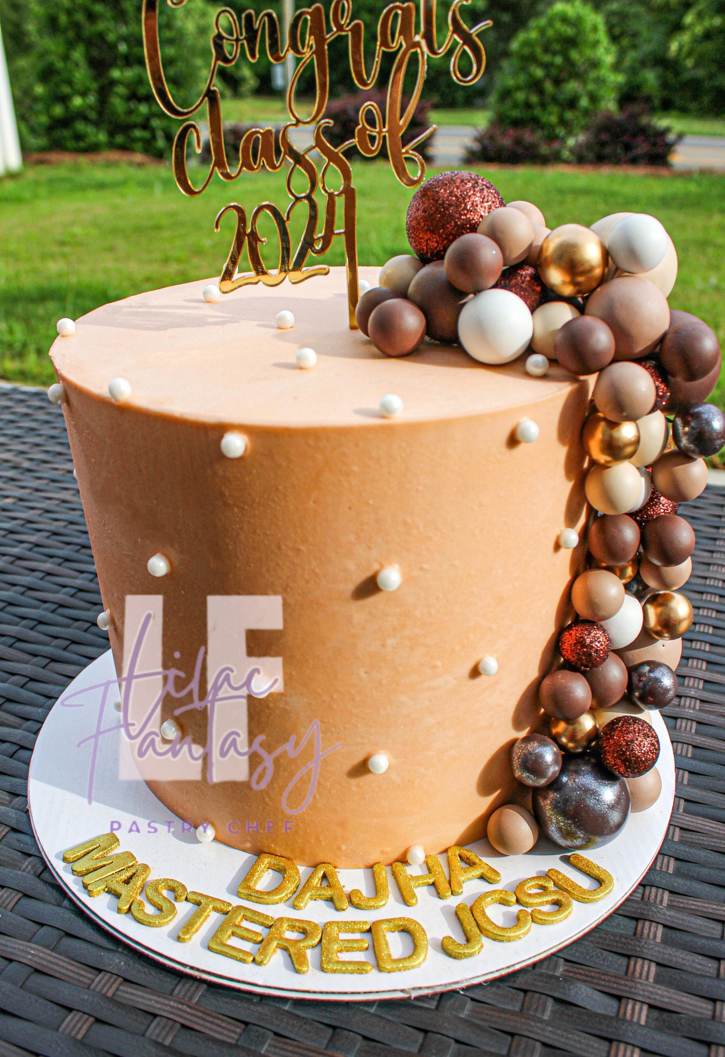 8-inch Custom class of 2024 cake baked by pastry chef Lilac
