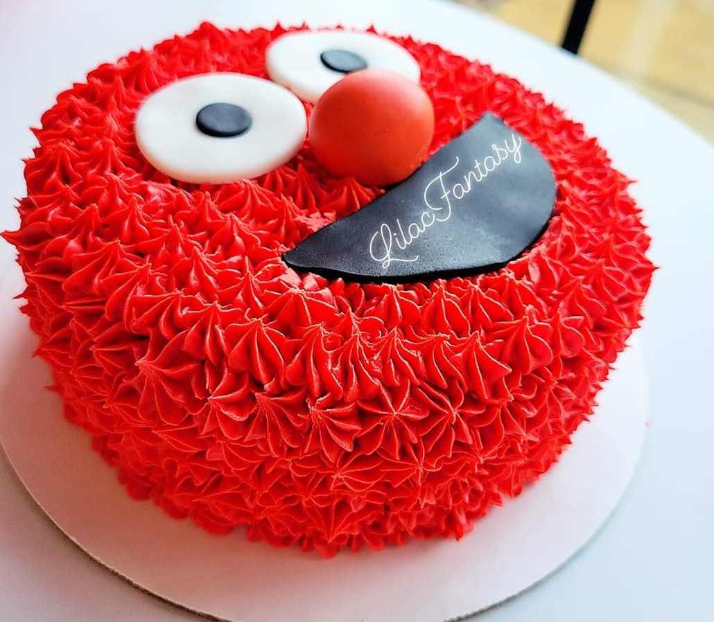 4-inch custom smashcake designed to look like Elmo, baked by pastry chef Lilac