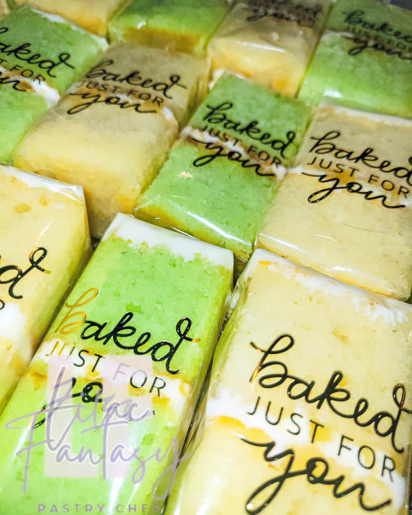 Green and yellow cakes slices individually packaged with "baked just for you" by pastry chef Lilac