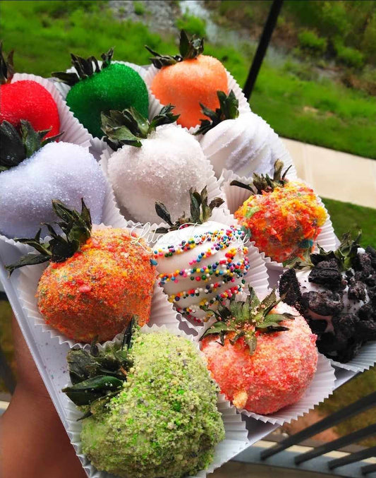 Chocolate covered strawberries in an assortments of colors from pastry chef Lilac